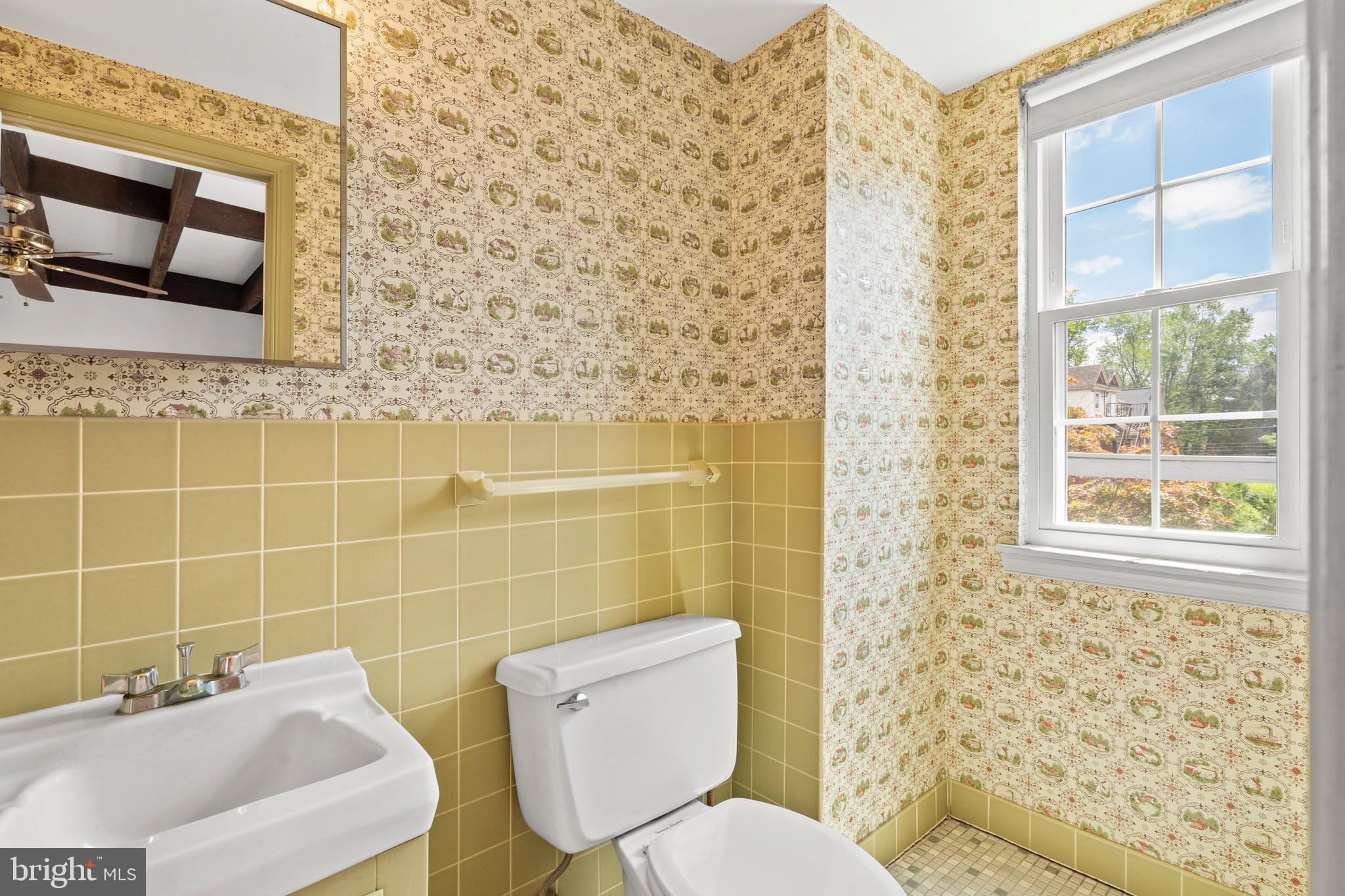 15 Llanfair Road, Unit B Ardmore, PA 19003 - Photo 16 of 25 a bathroom with a toilet and a sink