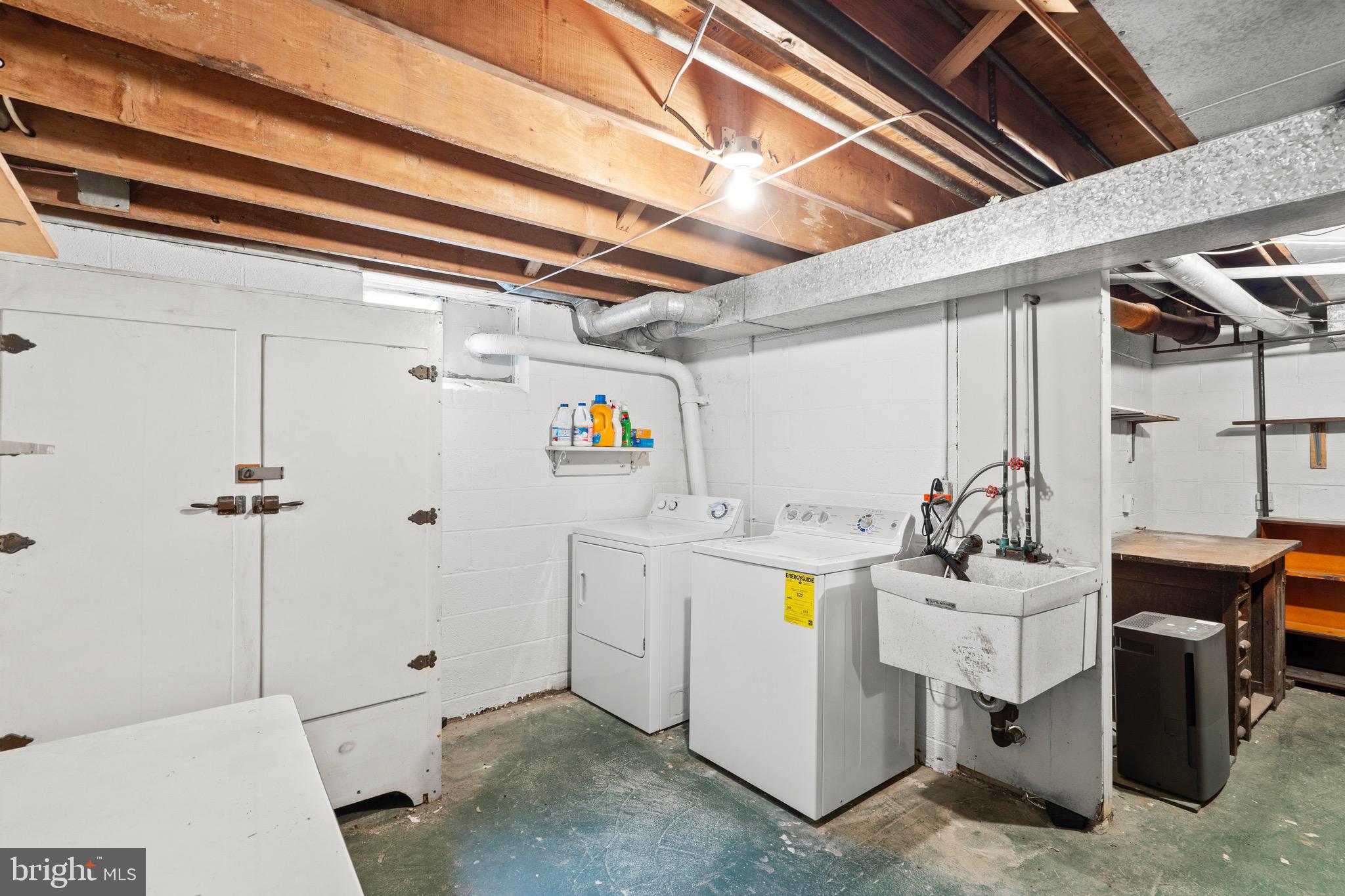 15 Llanfair Road, Unit B Ardmore, PA 19003 - Photo 19 of 25 a utility room with dryer and washer