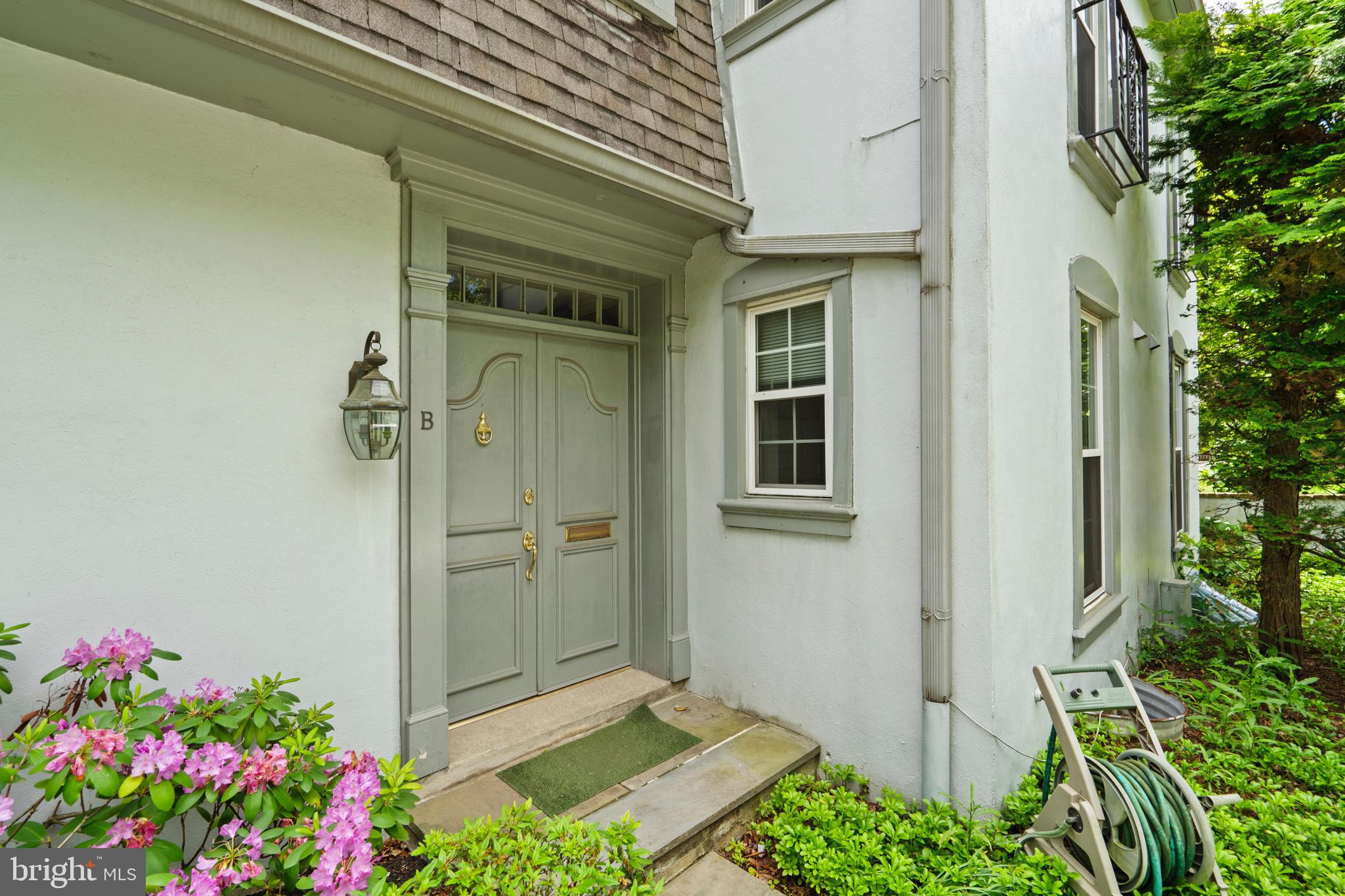 15 Llanfair Road, Unit B Ardmore, PA 19003 - Photo 2 of 25 a house with a entryway