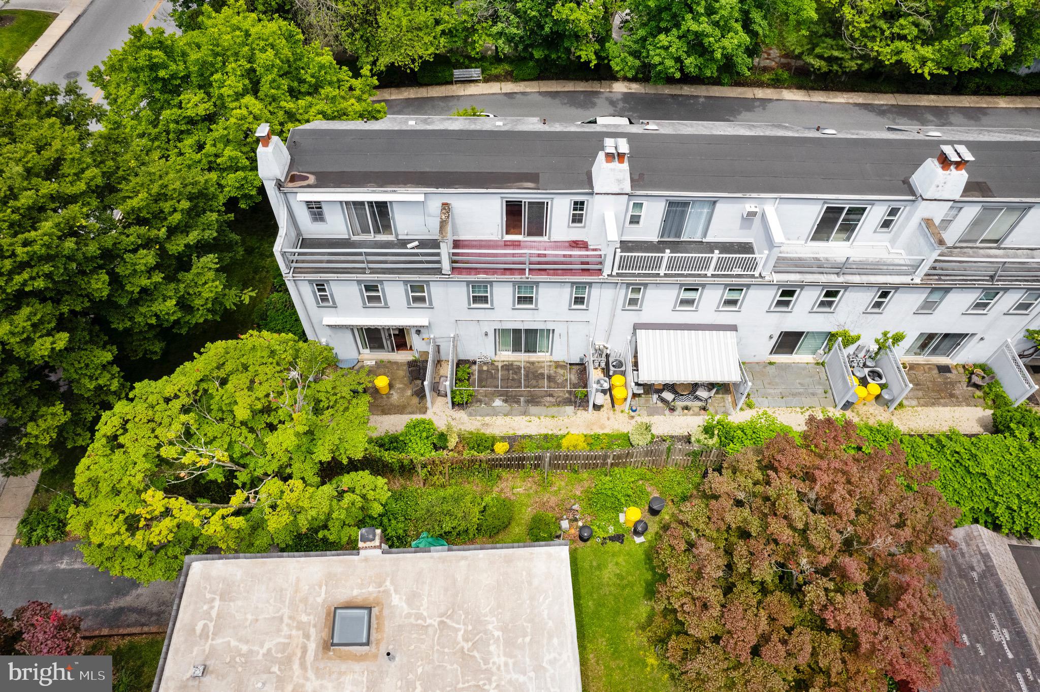 15 Llanfair Road, Unit B Ardmore, PA 19003 - Photo 22 of 25 a aerial view of a house with a swimming pool