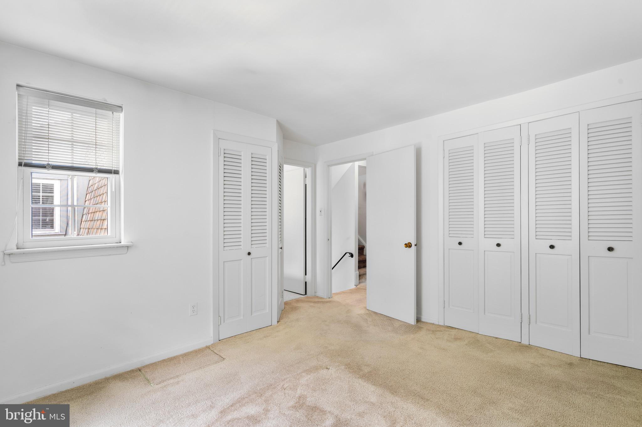 15 Llanfair Road, Unit B Ardmore, PA 19003 - Photo 9 of 25 a view of an empty room with windows