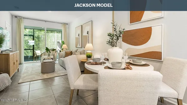 a dining room with furniture and wooden floor