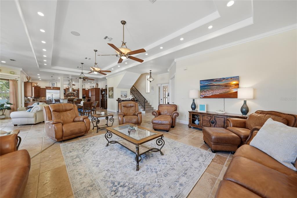 8635 Southwest Riverside Drive Arcadia, FL 34269 - Photo 9 of 70 a living room with furniture and wooden floor
