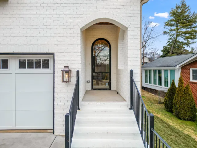 a view of entrance gate of a house