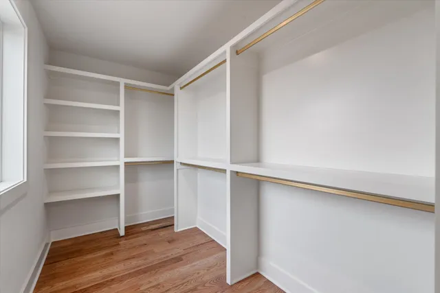 a view of an empty walk in closet