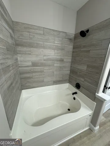 a bathroom with a bathtub