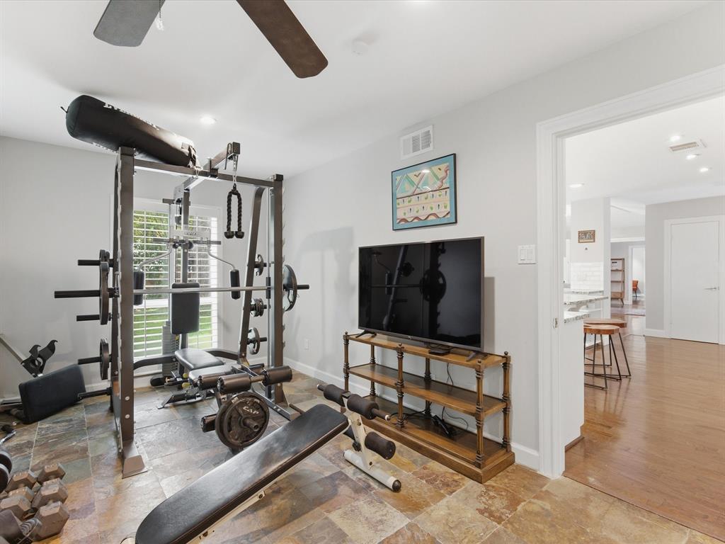 6160 Spring Valley Road Dallas, TX 75240 - Photo 12 of 40 Versatile bonus room with slate tile flooring and a ceiling fan