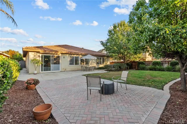 a view of a park with large trees