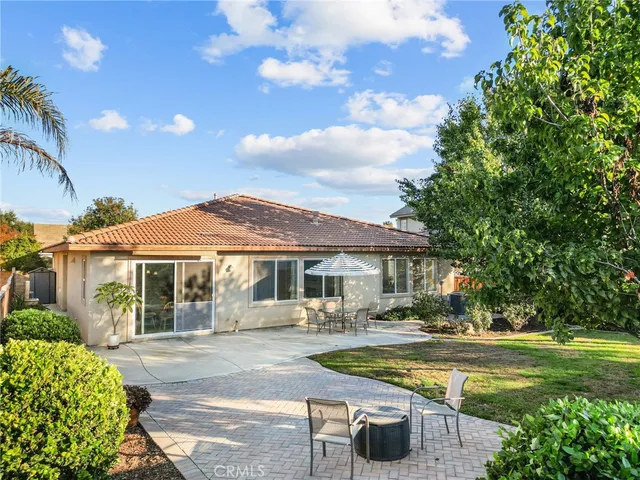 an aerial view of a house with swimming pool