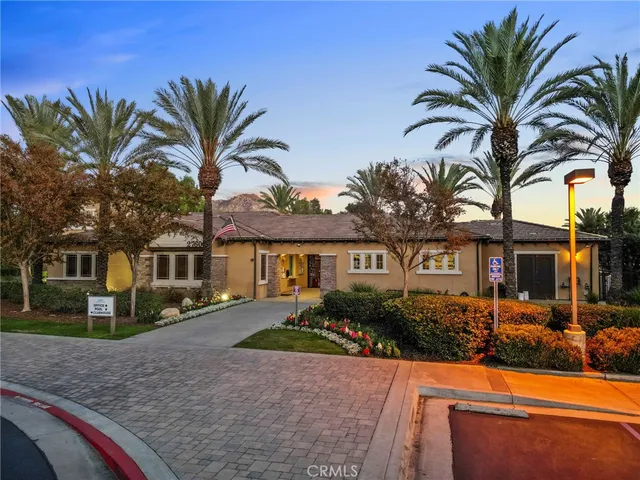 an aerial view of residential house with outdoor space and swimming pool