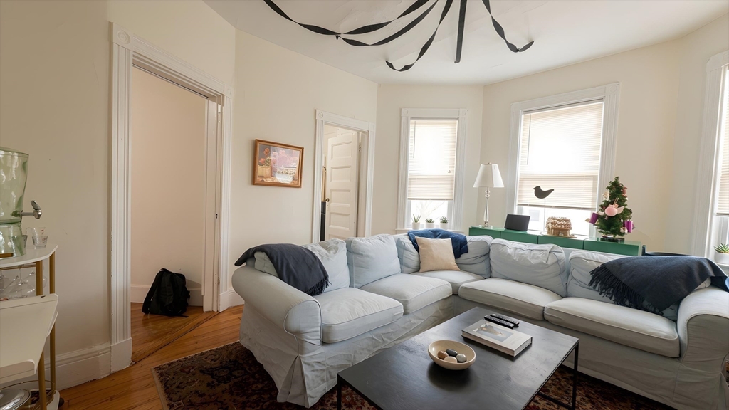 26 Darling Street, Unit 2 Boston, MA 02120 - Photo 13 of 15 a living room with furniture and a window