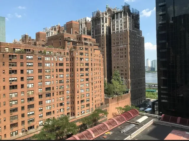 a view of a city with tall buildings