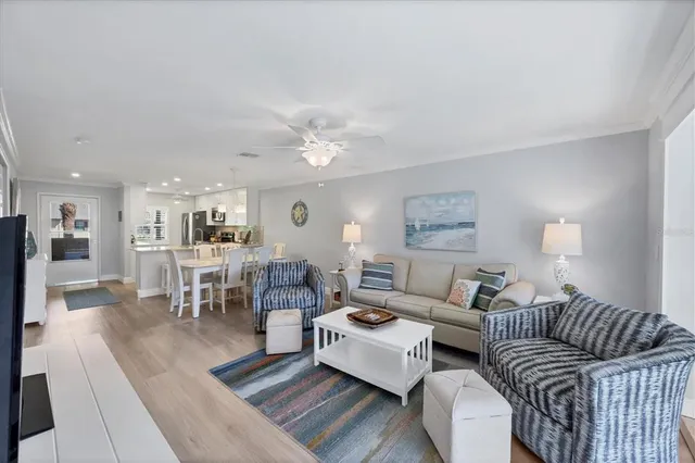 a living room with furniture and a table