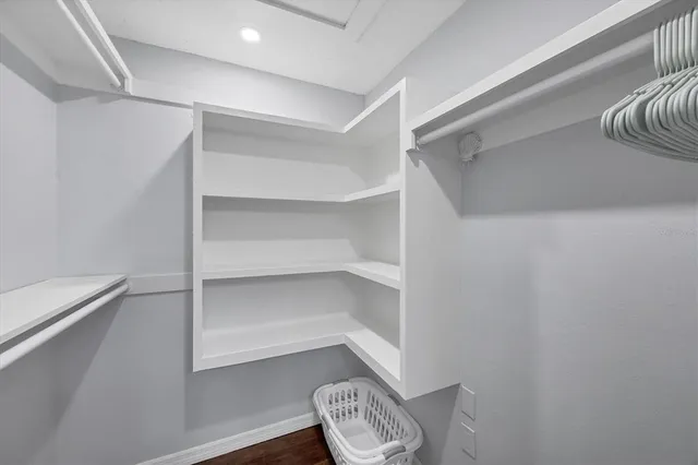 a view of room with racks on the wall