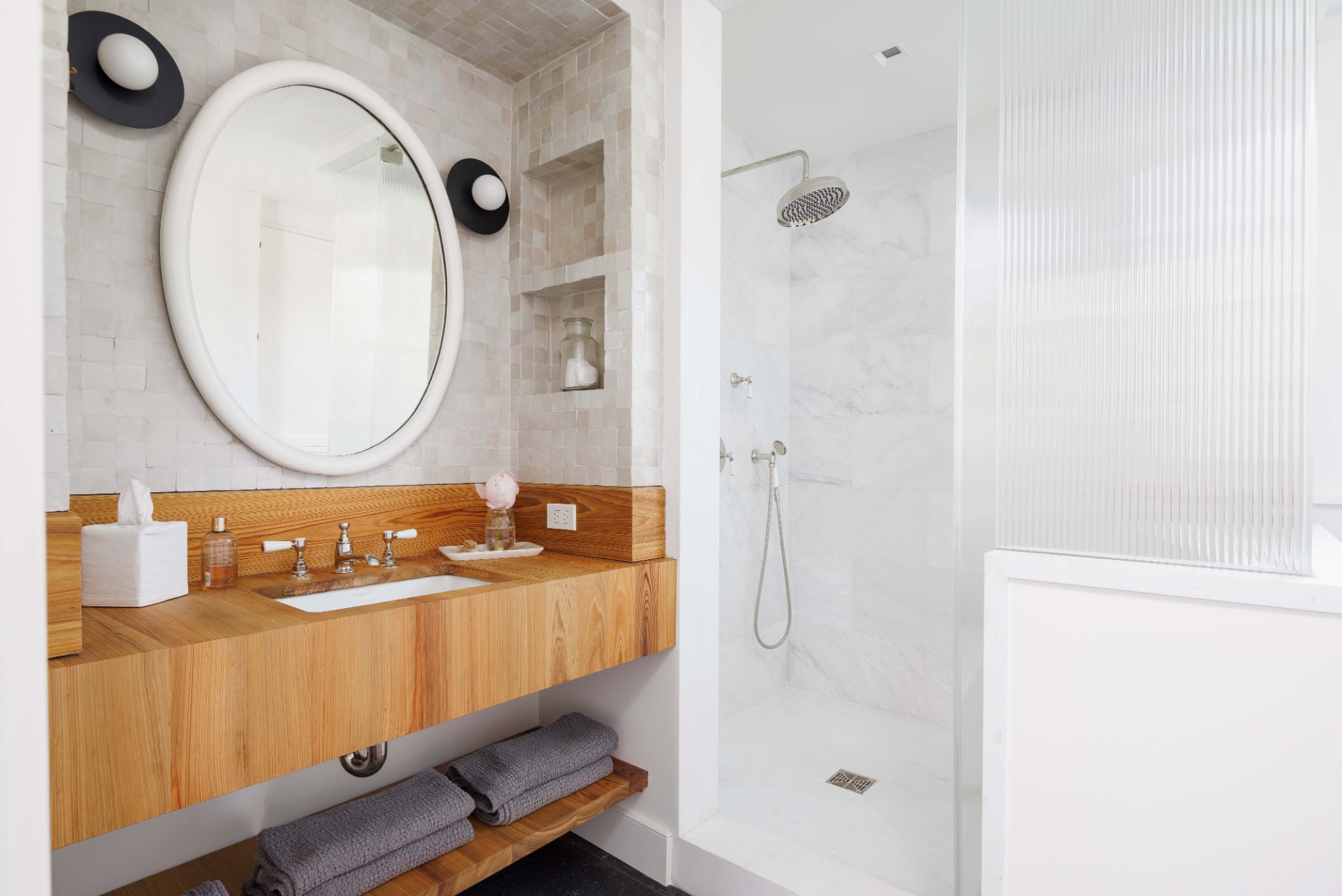 25825 Main Road Orient, NY 11957 - Photo 12 of 28 a bathroom with a sink a mirror and a shower