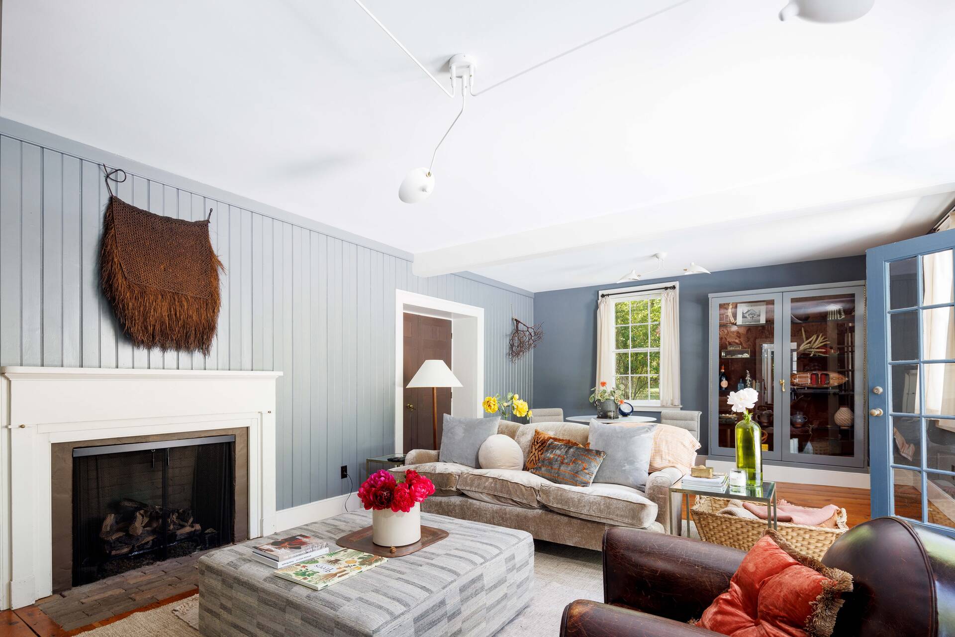 25825 Main Road Orient, NY 11957 - Photo 7 of 28 a living room with furniture a flat screen tv and a fireplace