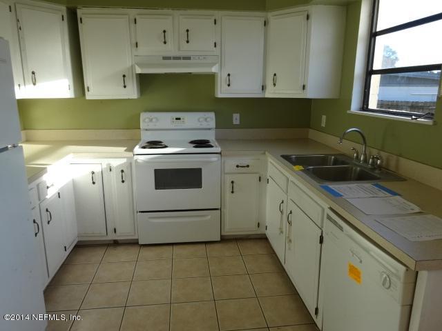 2608 Randy Road Jacksonville, FL 32216 - Photo 5 of 11 a kitchen with cabinets appliances and a sink