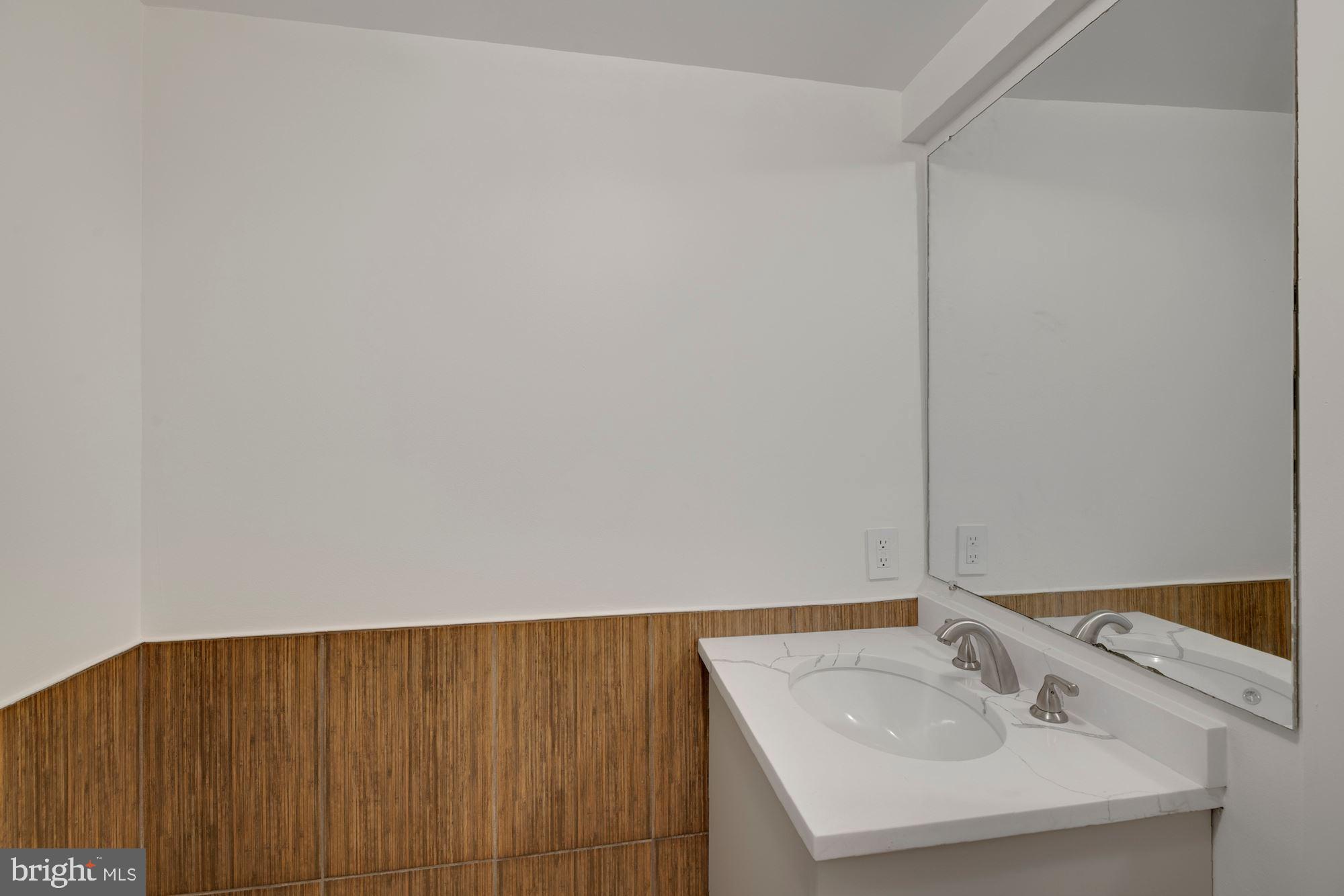 4480 Dexter Street Northwest Washington, DC 20007 - Photo 28 of 33 Powder Room with New Vanity