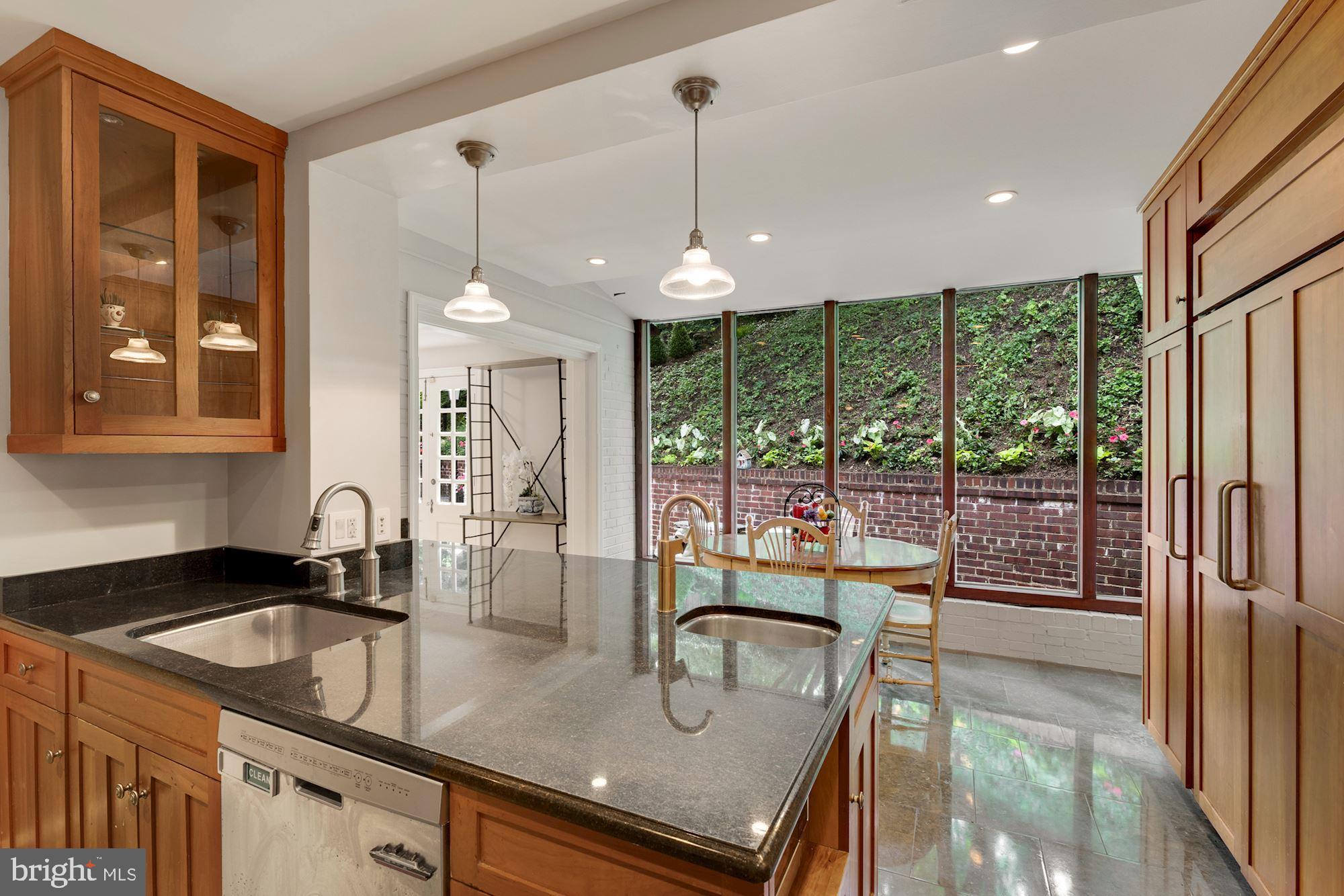 4480 Dexter Street Northwest Washington, DC 20007 - Photo 9 of 33 Gourmet Kitchen with Breakfast Bar