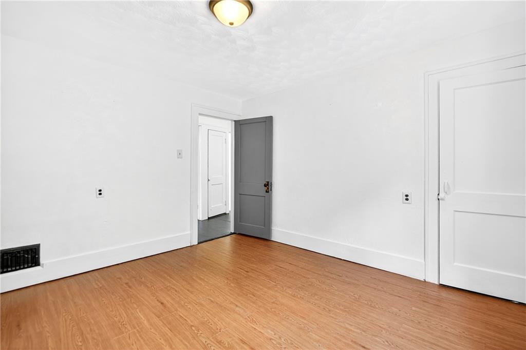 574 Webster Hollow Road Rostraver Township, PA 15012 - Photo 40 of 46 a view of a room with wooden floor