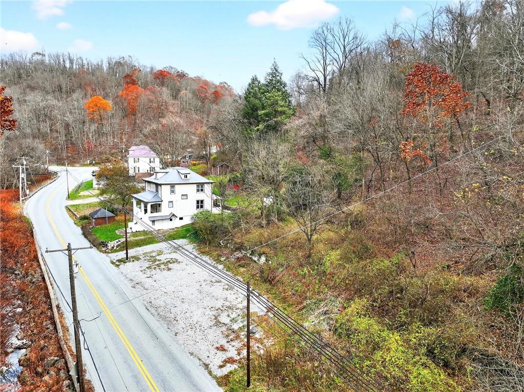 574 Webster Hollow Road Rostraver Township, PA 15012 - Photo 9 of 46 a view of a balcony with a swing