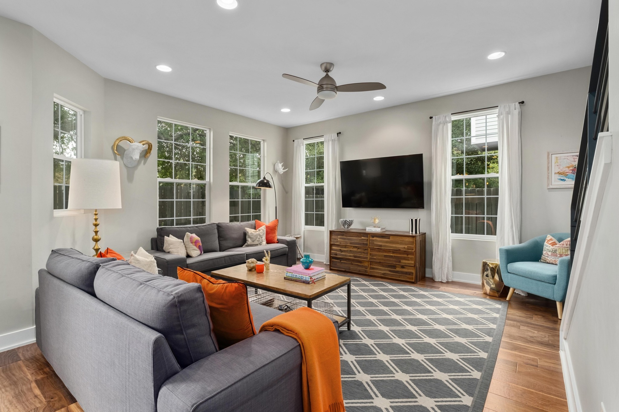 3302 Funston Street Austin, TX 78703 - Photo 6 of 36 Living area with wood finished floors, recessed lighting, and a ceiling fan