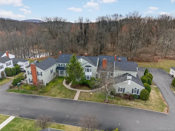 an aerial view of residential house with outdoor space