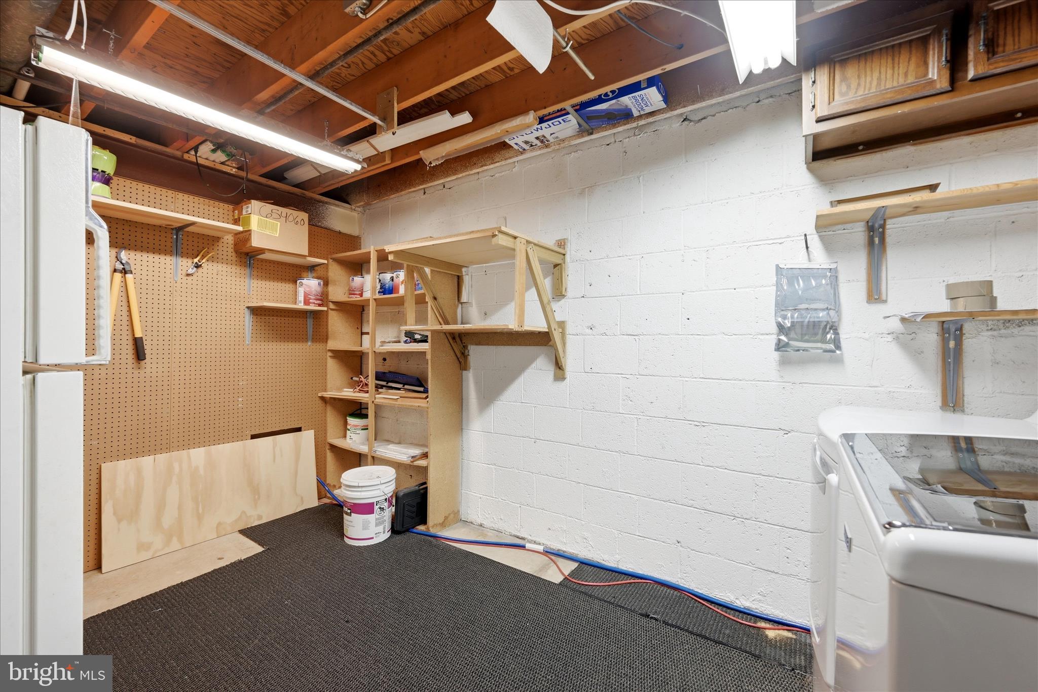 5446 Lighthouse Lane Burke, VA 22015 - Photo 28 of 36 a utility room with dryer and washer
