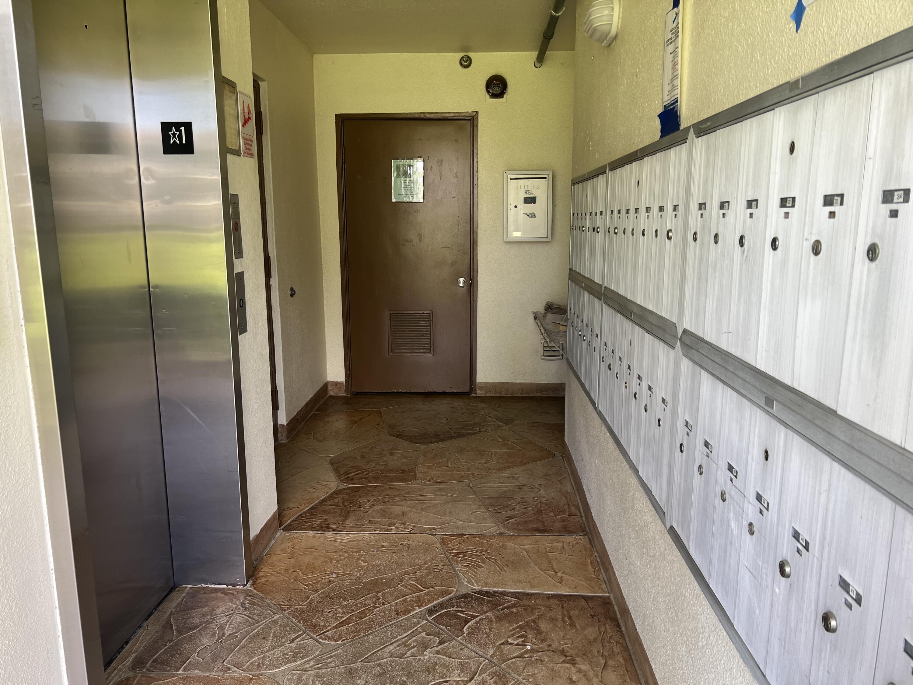 36 Mansfield B Boca Raton, FL 33434 - Photo 14 of 17 !st FL Elevator and Mailboxes IMG_5428