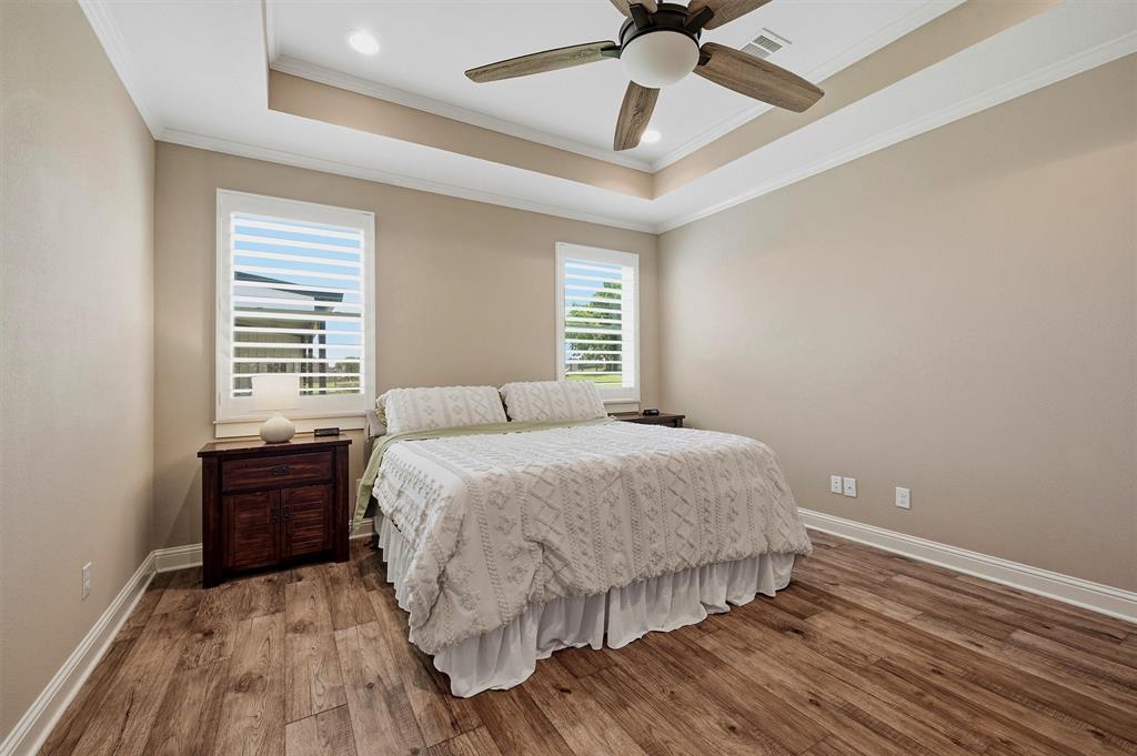 662 Preakness Place Road Van Alstyne, TX 75495 - Photo 13 of 39 a bedroom with a bed and window