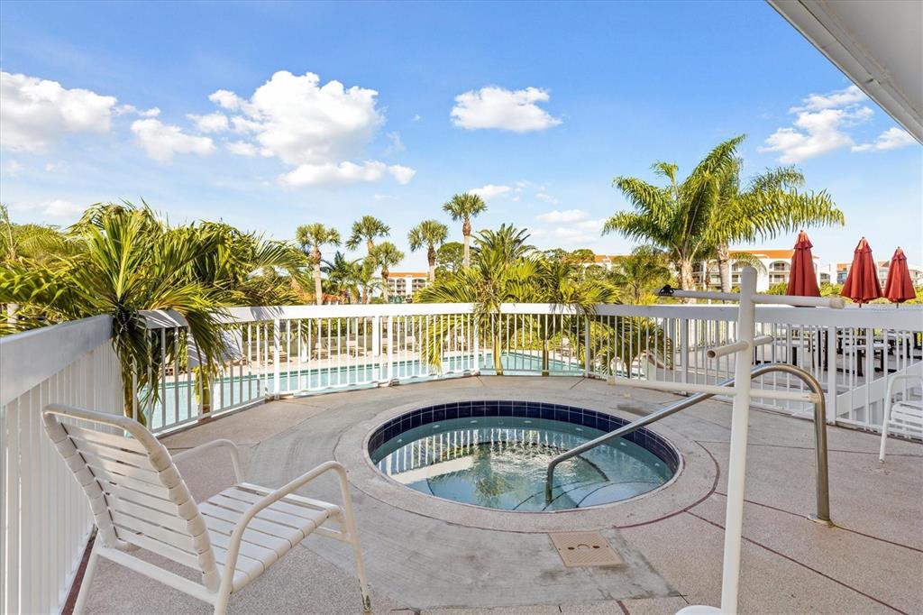 1800 Mariner Drive, Unit 9 Tarpon Springs, FL 34689 - Photo 36 of 41 a view of swimming pool from a balcony