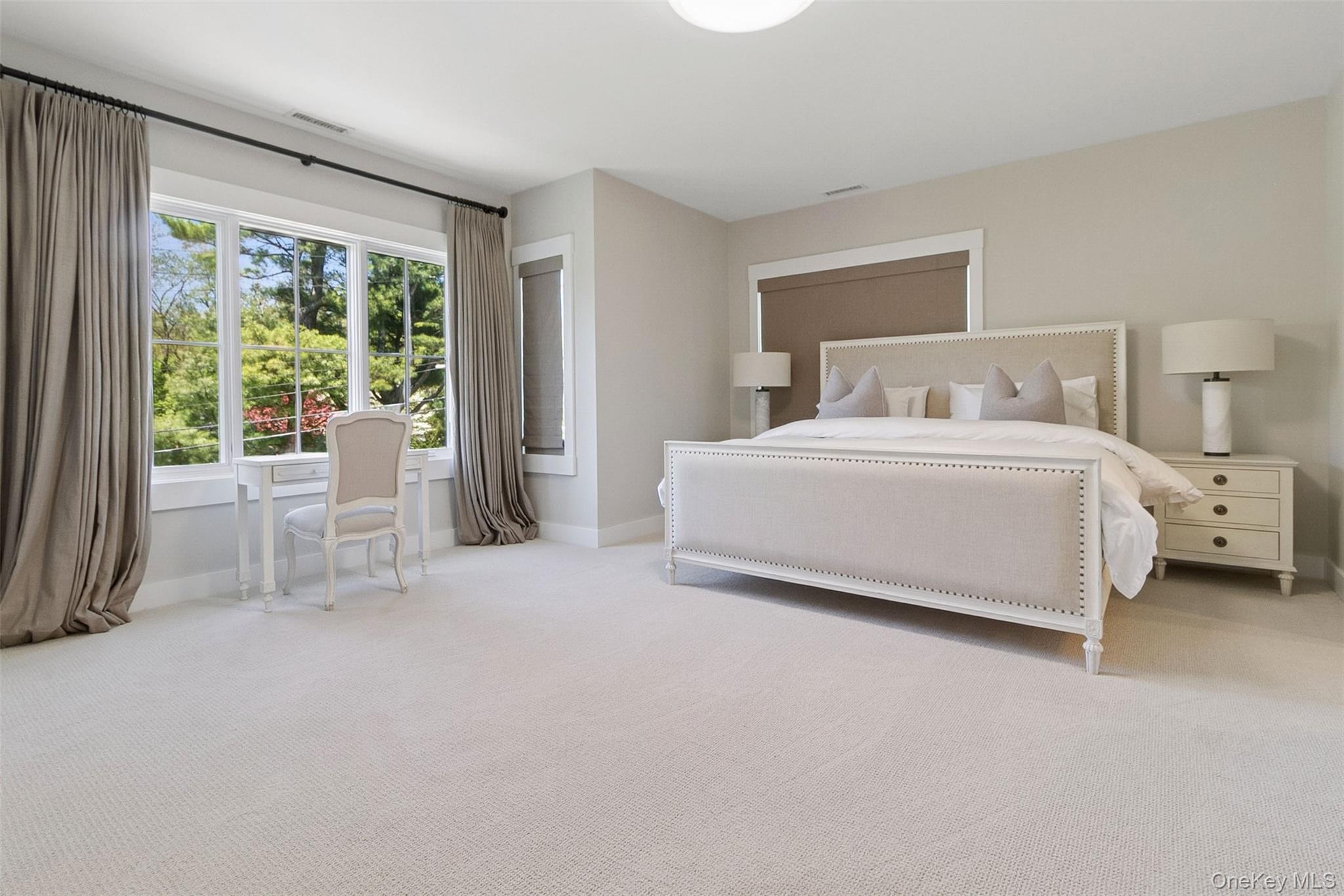 1 Stonewall Lane Mamaroneck, NY 10543 - Photo 15 of 33 a room with a bed and a chair