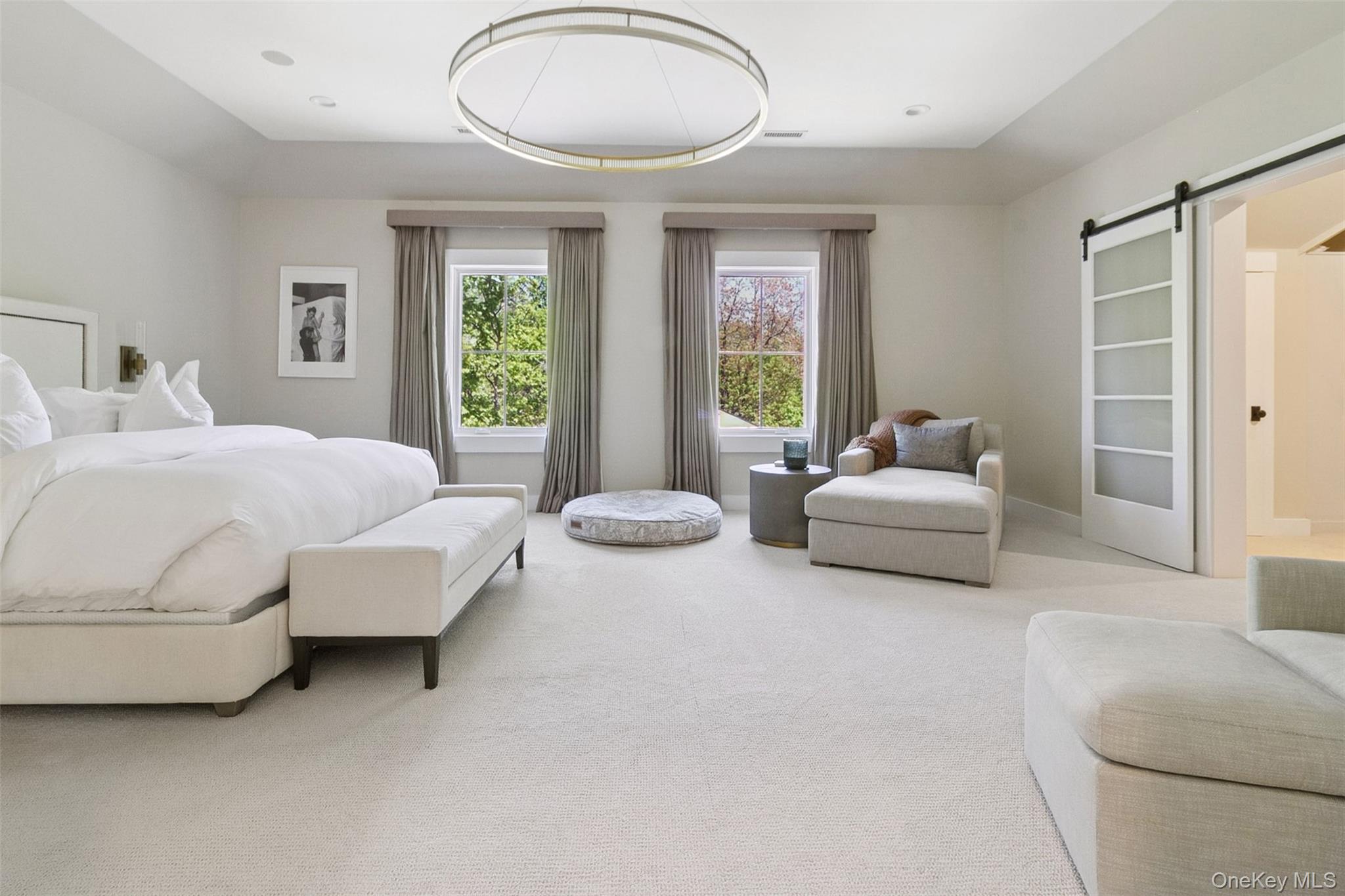 1 Stonewall Lane Mamaroneck, NY 10543 - Photo 18 of 33 a spacious bedroom with bed and a large window