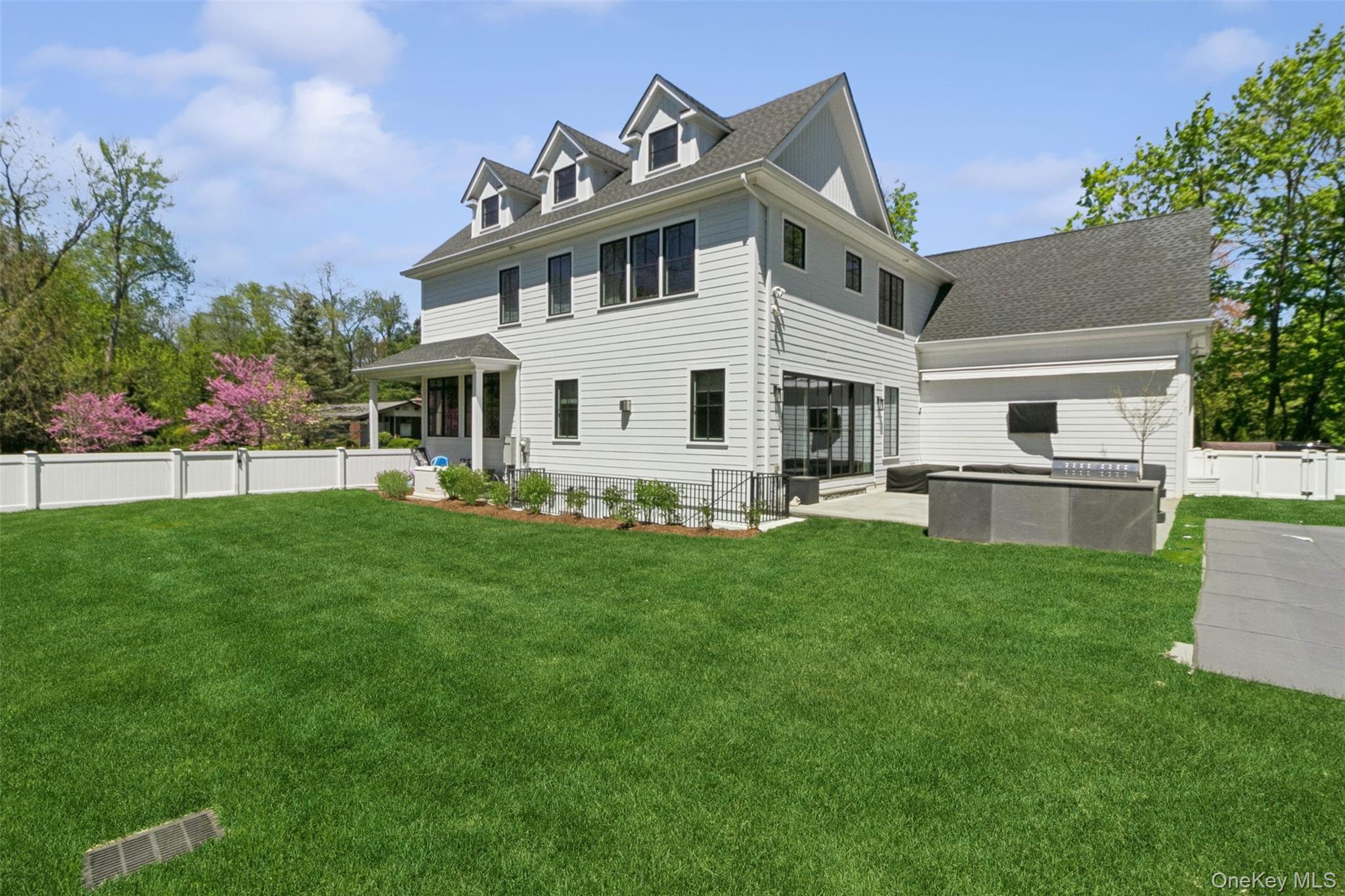 1 Stonewall Lane Mamaroneck, NY 10543 - Photo 28 of 33 a front view of a house with a yard