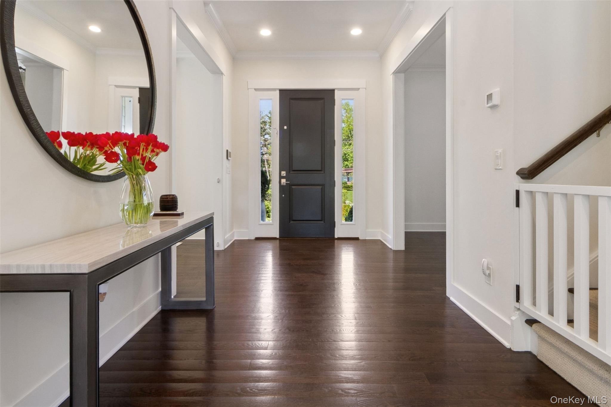 1 Stonewall Lane Mamaroneck, NY 10543 - Photo 3 of 33 a view of an entryway with wooden floor