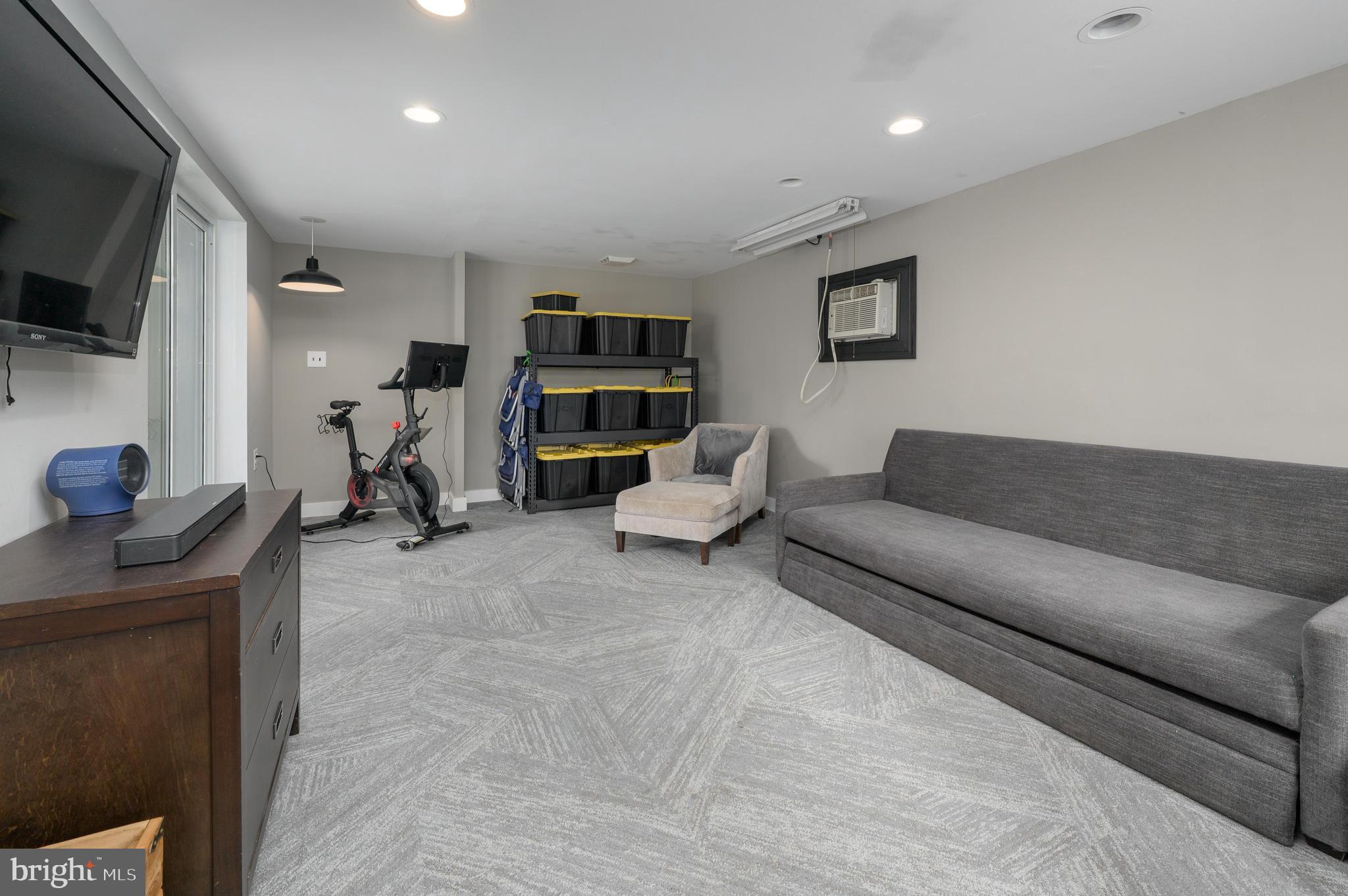 145 New Road Tabernacle, NJ 08088 - Photo 11 of 25 a living room with furniture and a flat screen tv