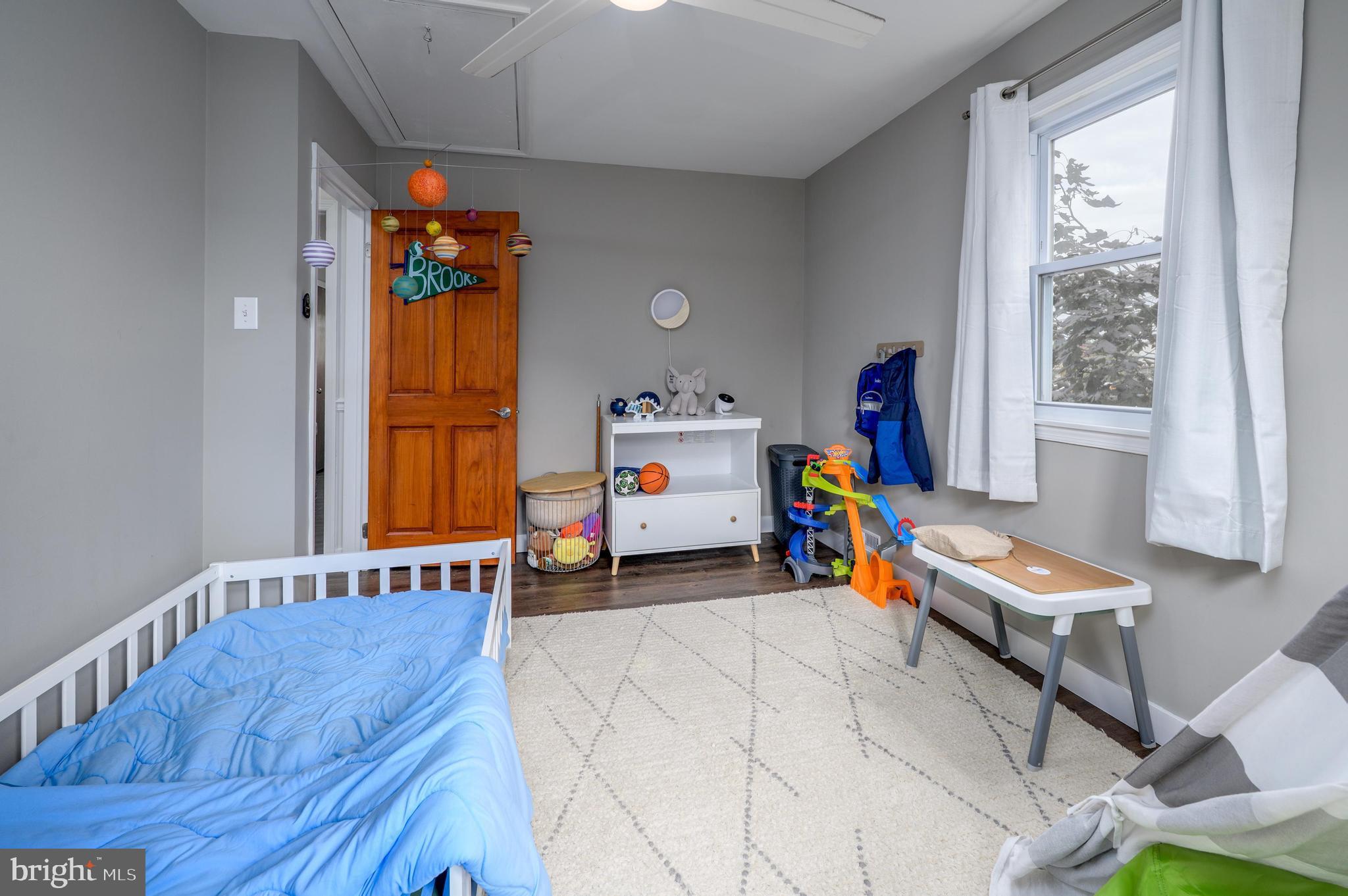 145 New Road Tabernacle, NJ 08088 - Photo 18 of 25 a children room with furniture and a window