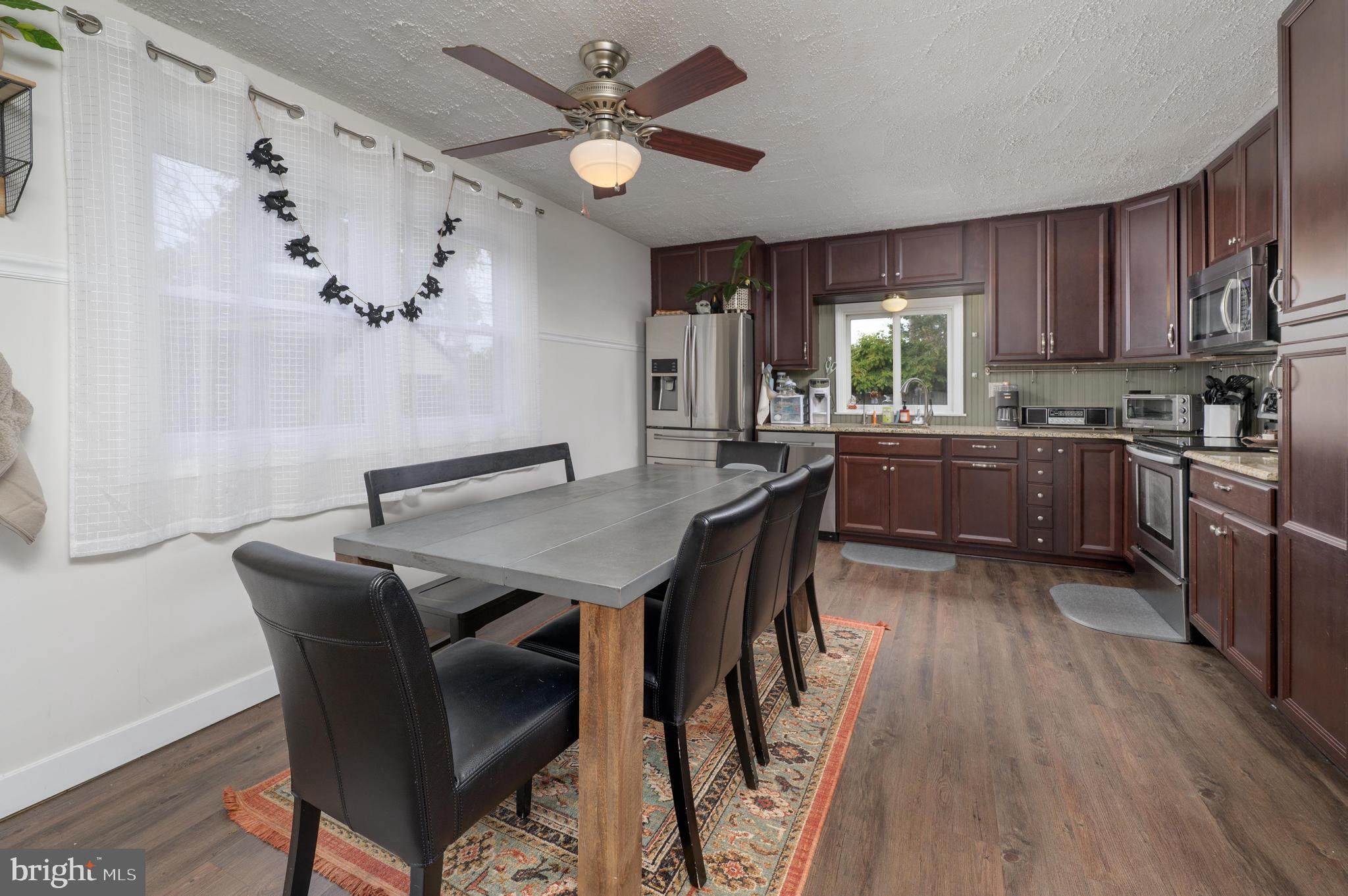 145 New Road Tabernacle, NJ 08088 - Photo 7 of 25 a view of a dining room with furniture window and wooden floor