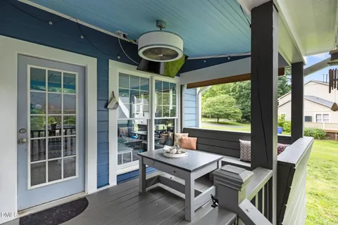 a picture of a room with a white wall and a picture of it