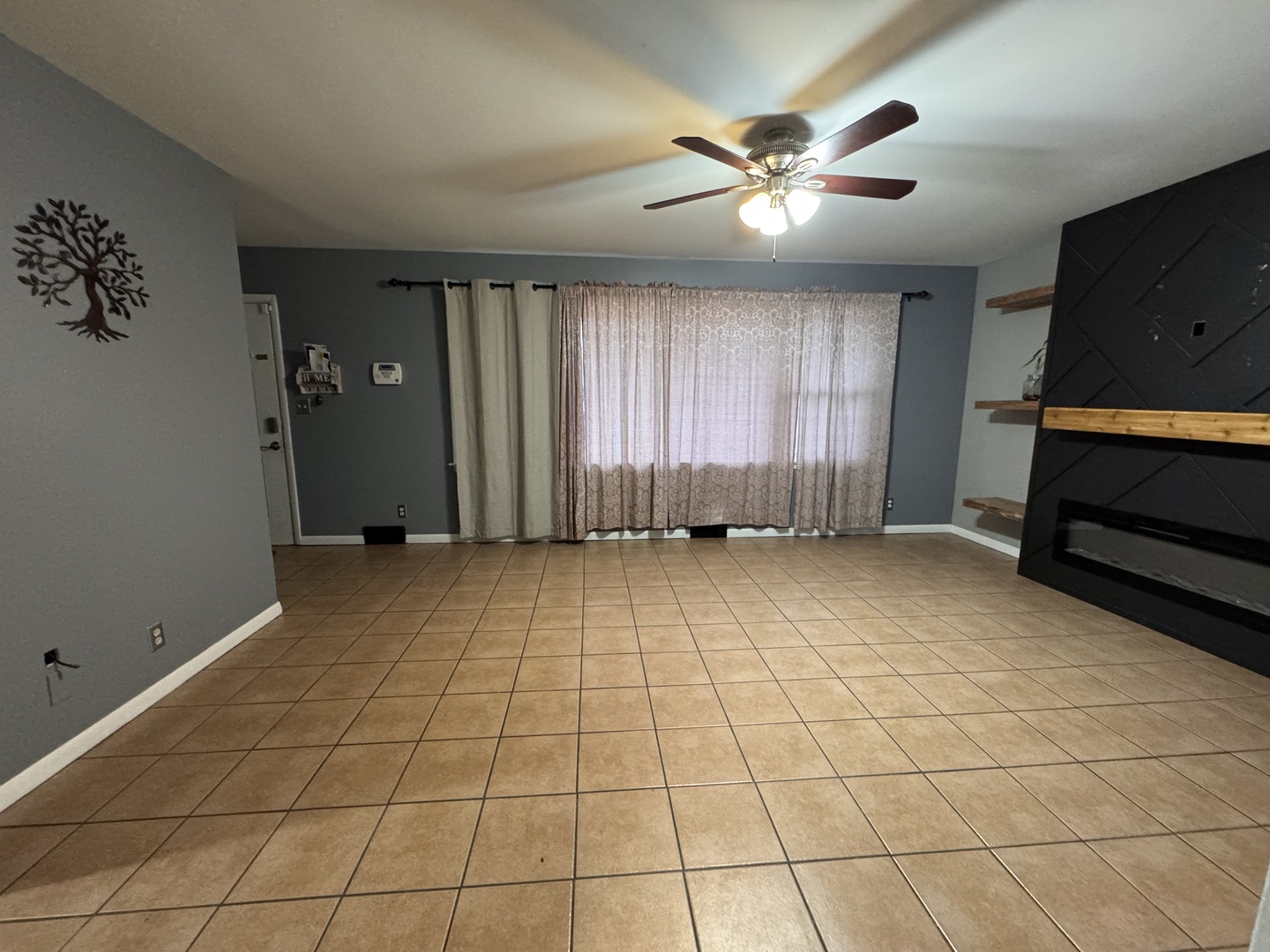 403 Michigan Avenue Aurora, IL 60506 - Photo 3 of 12 a view of an empty room with a window