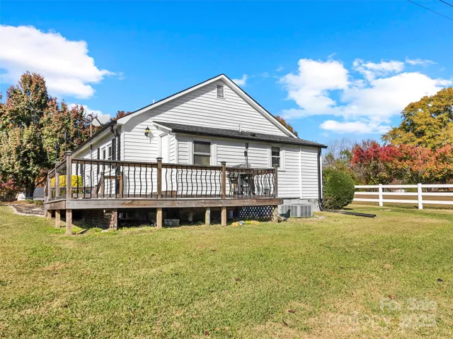 a view of a house with a swimming pool