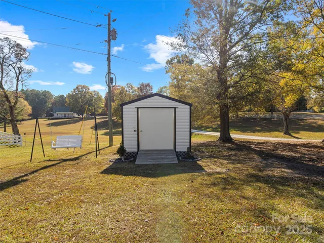 a view of house with outdoor space