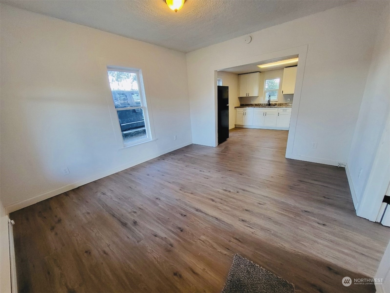 2200 Cooks Hill Road Centralia, WA 98531 - Photo 22 of 31 wooden floor in an empty room with a window