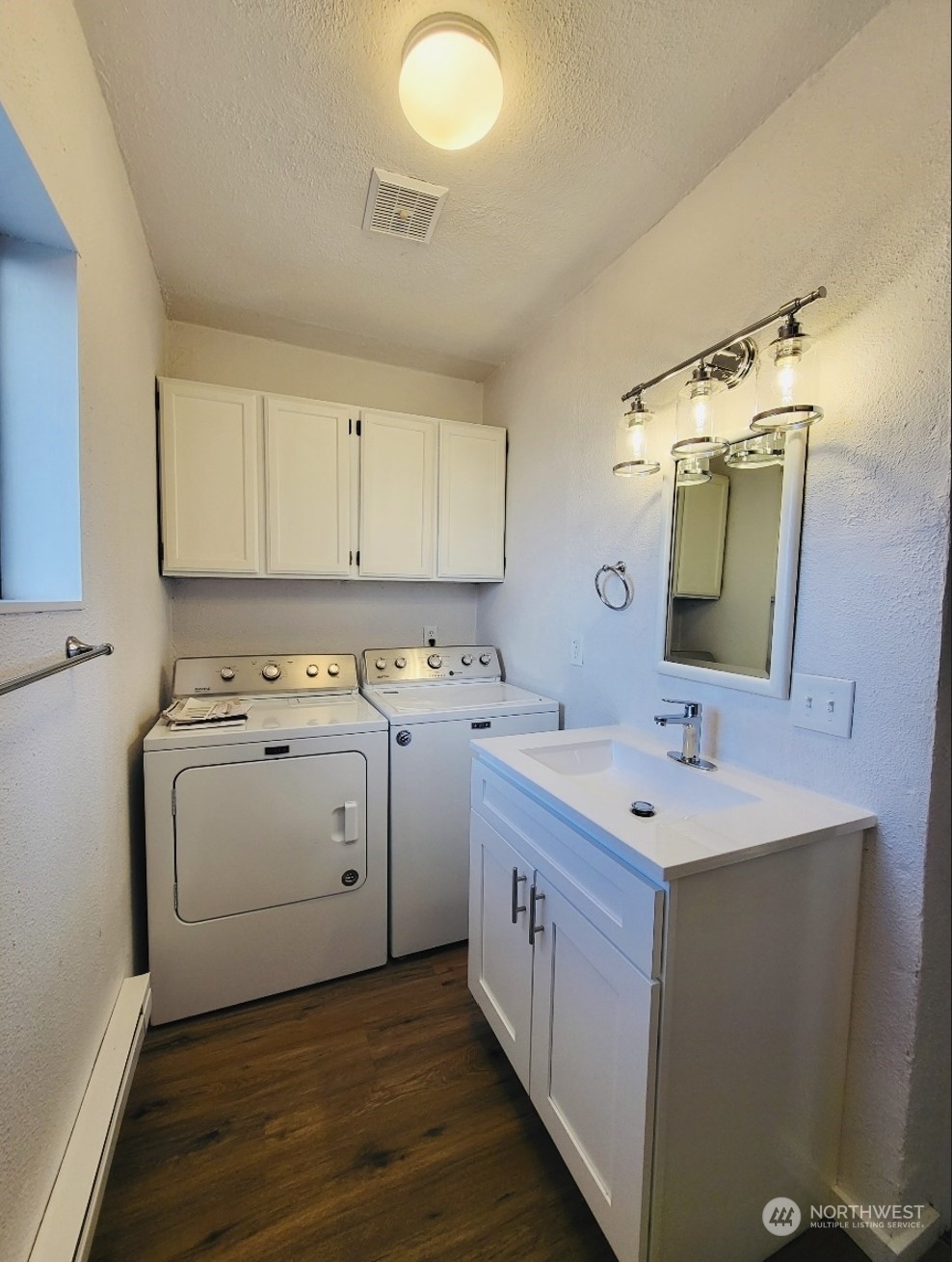 2200 Cooks Hill Road Centralia, WA 98531 - Photo 23 of 31 a utility room with cabinets washer and dryer