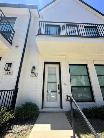 a view of entryway with a front door