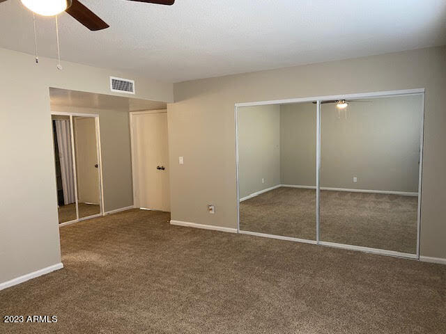 4926 West Phelps Road Glendale, AZ 85308 - Photo 8 of 25 Master bedroom w/ 2 closets
