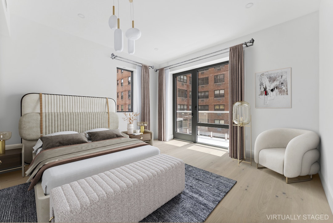 244 East 52nd Street, Unit PH7 Manhattan, NY 10022 - Photo 12 of 23 a bedroom with a bed couch and a window