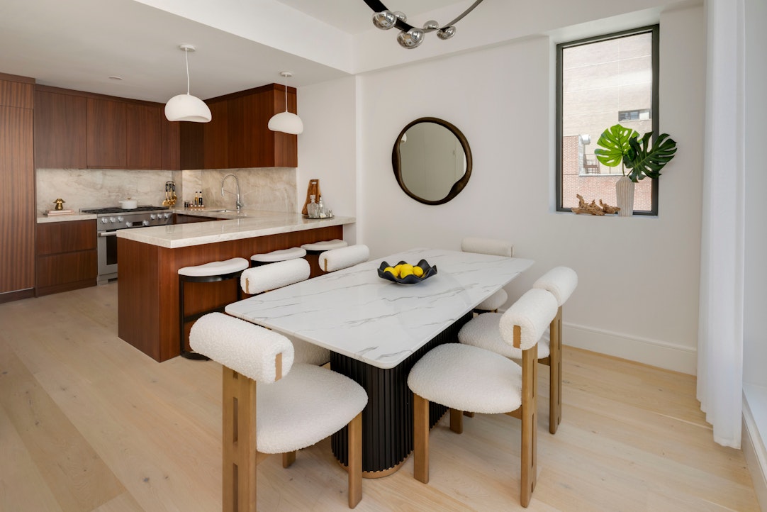 244 East 52nd Street, Unit PH7 Manhattan, NY 10022 - Photo 5 of 23 a view of a dining room with furniture