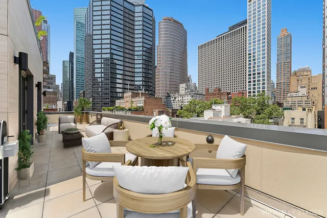 a bedroom with bed and a window