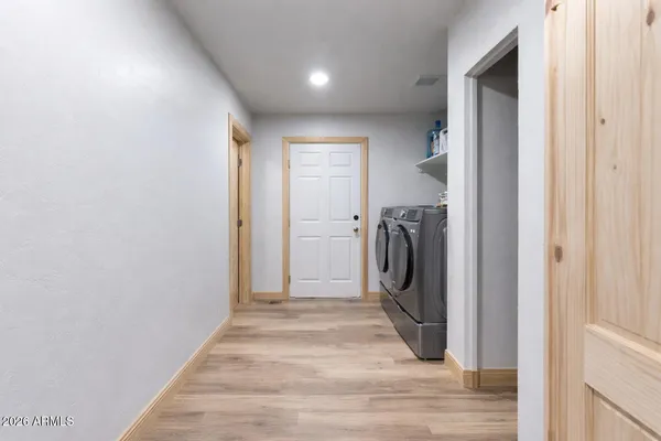 a bathroom with a toilet sink and shower